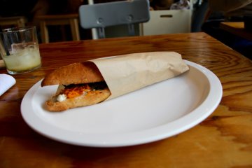 <p>Today's recommended sandwich: ricotta cheese, spiced salami, carrot and fried carrot leaf</p>