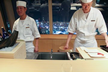 <p>Sushi bar with views of the Tokyo skyline</p>
