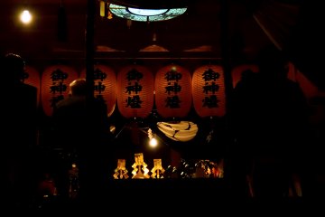 Before the fireworks event, a prayer is said at the shrine.