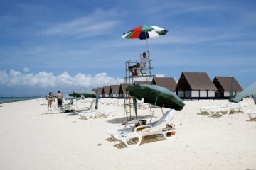 The white coral sand beach at Nagannu