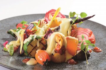 Raclette cheese with grilled vegetables