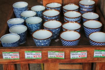 <p>Teacups with classical Japanese designs</p>