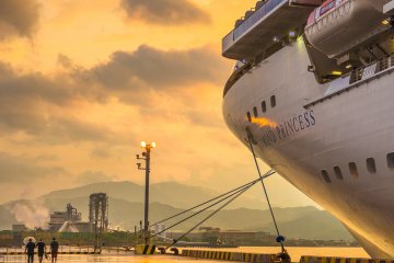 Crew take a much needed break strolling on a wet Tokushima dock