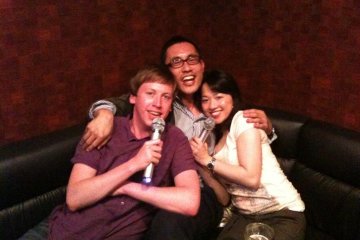 Jason with Shin–san & Mitsuko–san on their third date, now married.