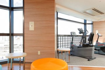 <p>The gym on the 11th floor offers a view over Utsunomiya Station</p>