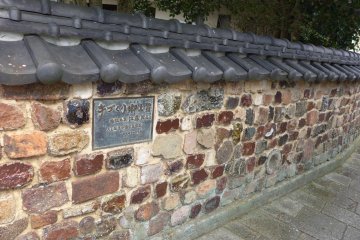 <p>This wall was made from pieces of old kilns</p>

