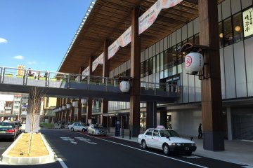 West facade and taxi stand.