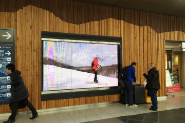 Flat screen digital displays promote tourism in Nagano.