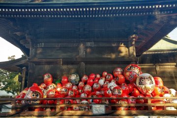 Dolls piled up in front of the main prayer hall waiting to be burnt during a &nbsp;Buddhist ceremony