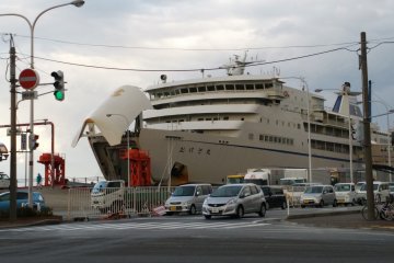 Ferry are taking up car before departure from Sado Island bound for Niigata