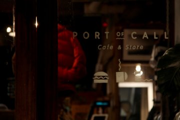<p>Port of Call with its cute logo: a burger, a mug and a spool of thread</p>