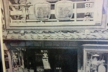 One of the historical photographs hanging by the door