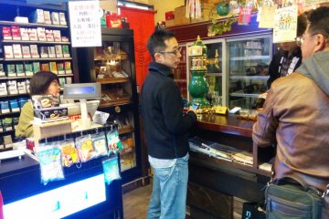 Even with two customers, the shop begins to feel lively