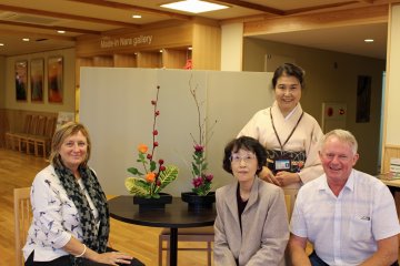 <p>The ikebana instructors take part in the moment</p>