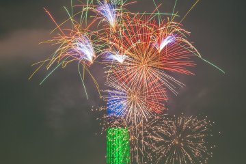 Colorful fireworks in front of the Tokyo Skytree