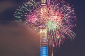 Colorful fireworks in front of the Tokyo Skytree