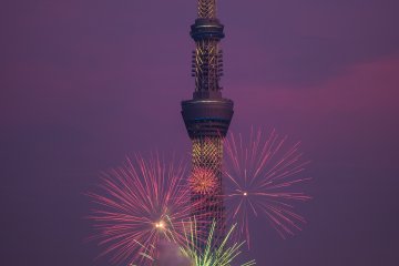 Colorful fireworks in front of the Tokyo Skytree