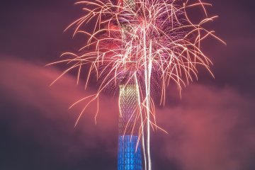 A tree of light in front of the Skytree