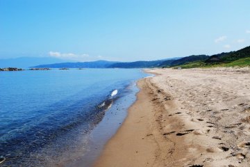 A deserted sandy beach in summer? Where else do you find that?