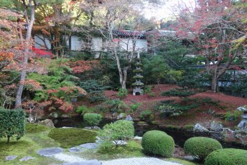 <p>The corner of the garden features several lanterns</p>
