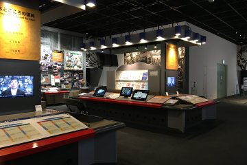 <p>The exhibit hall houses countless photos and video interviews. Many had English labels and explanations.</p>