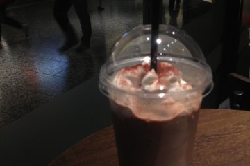 <p>The drink, the big window, and the people walking back and forth.</p>