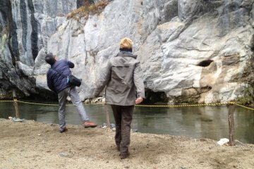 <p>There is a small opening across the river believed that if you can throw a stone inside the hole, you'll get a good luck. You can purchase the lucky stones from the boatmen, 100 yen for 5 stones.</p>