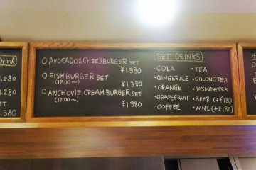 <p>An English version of the menu is chalked above the bar</p>