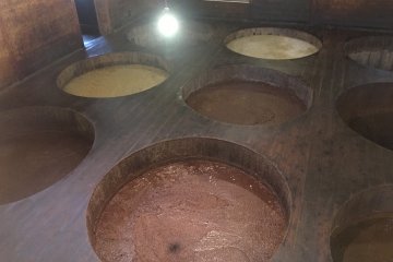 <p>When a button is pressed, the lamp on top of the respective barrel will light up to show you the colour of the fermented soy beans.</p>