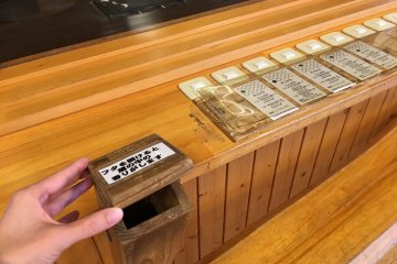 <p>You can also open some lids to smell the different stages of the fermented soy beans. Be warned it doesn't smell very good.</p>