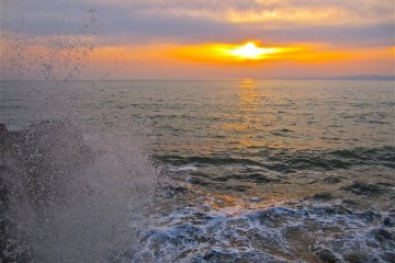 Spray and sunset