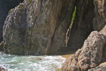 The cave on the sandy beach