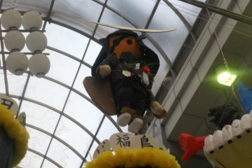 A paper version of lengendary samurai local Masumune Date on Clis Road in Downtown Sendai