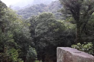 <p>A lookout point over a cloudy vista</p>
