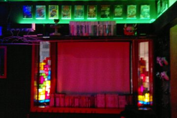 <p><span style="line-height: 20.8px;">Tetris-tiled window with green neon.</span></p>
