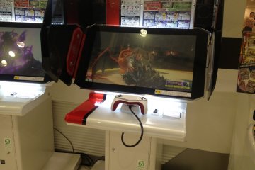 <p>Gaming machine just near the action figures section</p>
