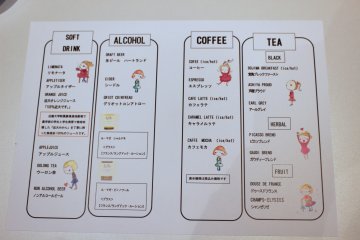 <p>The bi-lingual menu. Prices were not affixed to this special event version</p>
