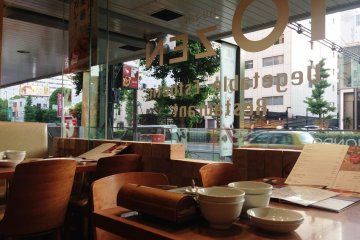 Take a seat in one of the booths or next to its large wrap around windows. 