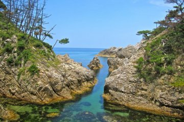 A small stream meets the Sea of Japan at this point
