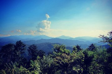 View of all the mountains in the area. If it's a clear day, you can see Mt. Fuji
