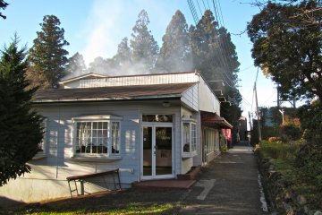 <p>A closed cafe, an empty alleyway and drifting smoke</p>
