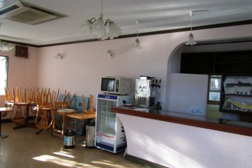 <p>The interior of the cafe. It looks like people left just yesterday</p>
