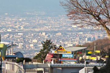 <p>The view of northern Osaka creates a stunning backdrop for the amusement park</p>
