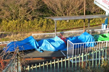 <p>Go-karts under tarps for the season</p>
