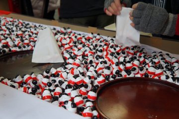 <p>A traditional Aizu good luck charm, called "okiagarikoboshi," which translates in English to "knock-down, stand-up small doll." Different colours denote different protections offered by the charm. Every year, locals buy the same number of charms as the members in their family, plus one additional one if they are hoping for a new child.</p>
