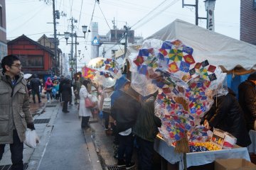 <p>Bright pinwheels add a splash of colour to a dreary rainy day.</p>
