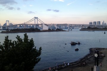<p>People can go down near the water to see a wider view of the bridge.</p>
