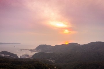 <p>The sun setting over the horizon</p>
