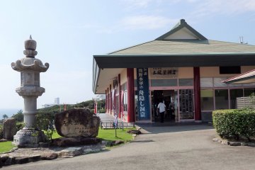 Inside this building is the ticket counter and elevators.