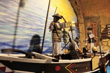 A re-creation of the pirates and one of their ships.